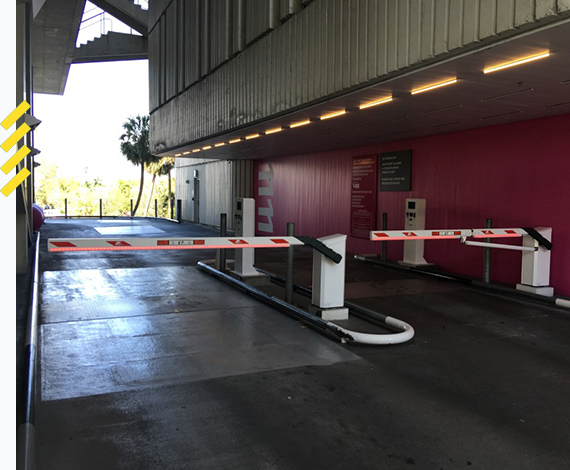 barrier gate system with parking arms on a parking garage