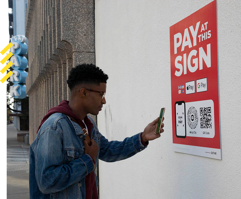 person scanning qr codes to pay directly for the ungated parking garage page